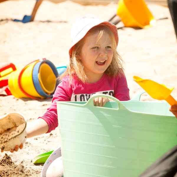 Child playing in the sand