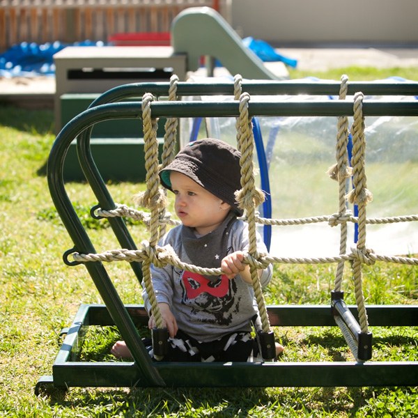 Young child playing outdoors