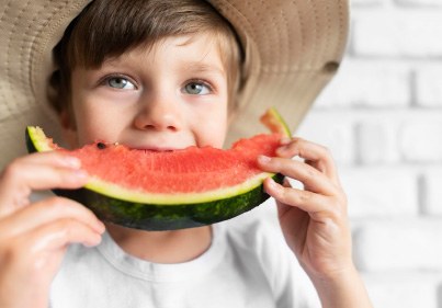 Child eating watermelon